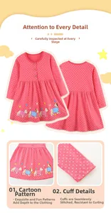 Detail of rose red long sleeve girls dress with white polka dots and puppy print
