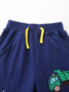Navy blue boys cotton joggers with yellow drawstring and green truck embroidery detail