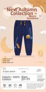 Detailed view of kids navy cotton joggers featuring colorful construction embroidery and yellow drawstring