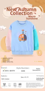 Detail of color-block cotton girl sweatshirt featuring cartoon beetle embroidery and rib cuffs