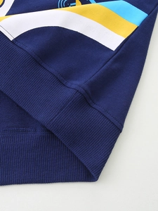 Sweat bleu marine pour garçon avec détail de l'ourlet côtelé et maille de coton rayée