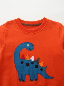 Orange long sleeve sweatshirt for boys featuring a blue cartoon dinosaur patch