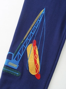 Kids navy cotton jogger pants featuring creative crane and hotdog embroidery detail