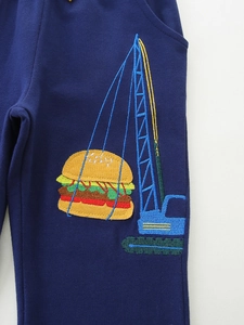 Navy blue kids joggers featuring detailed crane and burger embroidery on cotton fabric
