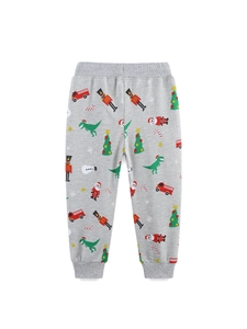 Kids grey jogger pants with festive Christmas pattern featuring Santa and nutcracker