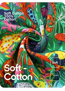 Gros plan sur maille de coton doux avec imprimés tropicaux de toucans et feuilles
