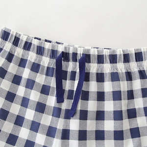 Boys summer cartoon set featuring blue gingham shorts with elastic drawstring waistband