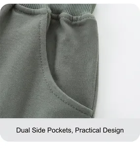 Detail of boys' sports shorts featuring elastic ribbed waistband and side pockets