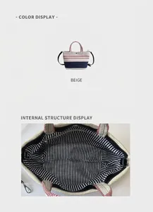 Detail view of striped canvas tote bag showing spacious interior and adjustable strap
