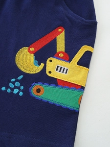 Boys navy knit shorts featuring a colorful excavator embroidery on high quality fabric