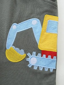 Boys summer cotton shorts featuring colorful cartoon excavator embroidery on grey fabric