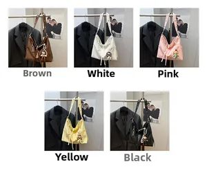 Collage of five minimalist large tote bags in various colors with drawstring closure detail