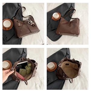 Detail view of large coffee brown tote bag showing interior storage and leather texture
