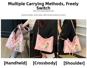Detailed view of pink leather tote bag showing handheld, crossbody and shoulder carry styles