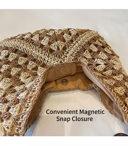 Detailed view of woven tote bag with magnetic closure and smooth brown fabric lining