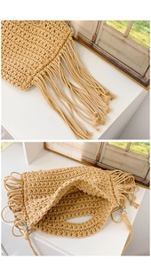 Detailed macro view of crochet cotton weave and long fringe tassels on the shoulder bag