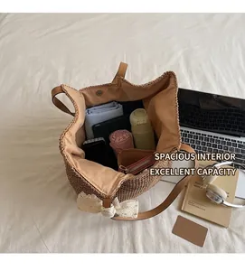 Interior view showing the large capacity of a woven tote bag with daily essentials