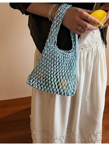 Light blue hollow knit handbag with handmade woven texture for summer fashion style