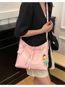 Pink large capacity faux leather shoulder tote bag with a cute cartoon doll pendant