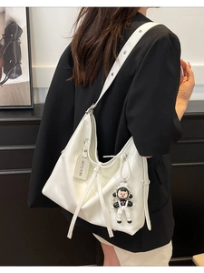 Minimalist white leather hobo bag for women with astronaut charm and large capacity