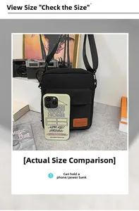 Detailed size comparison of black canvas crossbody phone bag next to an iPhone