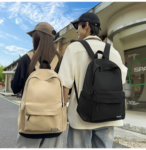Outdoor model display of khaki and black minimalist waterproof nylon backpacks for students
