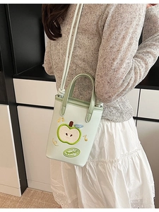 Fashionable light green bucket bag with apple embroidery and Panter letter detail