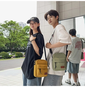 Canvas crossbody bags for couples in yellow and green with adjustable straps