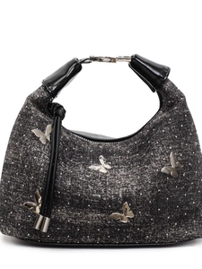 Sac à main à pois avec décorations papillon en métal et anses en cuir noir