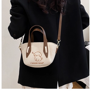 Fashionable denim embroidery shoulder bag with cream finish and cute cartoon dog print