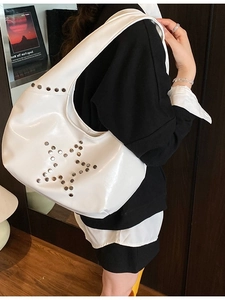 White glossy hobo shoulder bag with silver star rivet patterns and punk style design