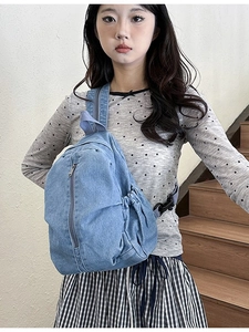 Sac à dos en denim bleu clair pour étudiants avec poche zippée et bandoulière réglable