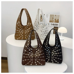 Collection of four chic faux leather bucket bags with stylish silver metal stud patterns