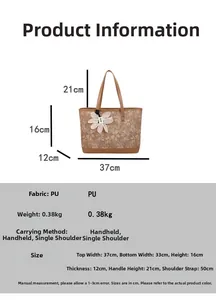 Detailed view of the large brown embossed tote bag with precise dimension measurements