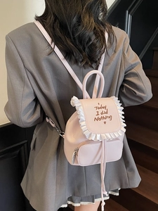 Pink minimalist backpack for women with white ruffle trim and Today I did Nothing embroidery