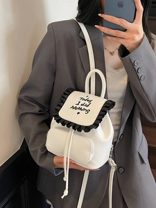 Mini white PU backpack with black ruffles and Today I did Nothing text print