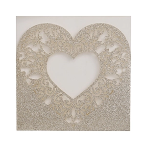 Detailed laser-cut heart invitation with champagne gold glitter lace floral patterns
