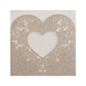 Glittery laser-cut champagne heart greeting card with intricate floral vine pattern