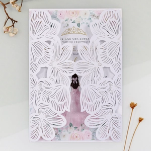 Detailed laser cut floral invitation cover with printed pink rose and crown insert