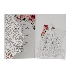 Laser cut white wedding invitation with hollow rose pattern and bridal gown silhouette