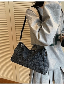 Chic leopard print tote bag with silver studs and mini coin purse for fashion commute