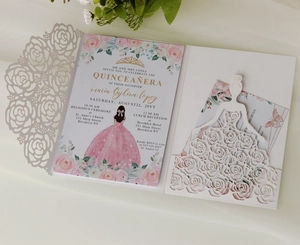 Detailed laser cut rose pattern on white quinceañera invitation with pink sequin dress girl