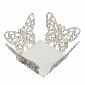 Detailed laser-cut butterfly hollow pattern on white paper candy box for wedding decor