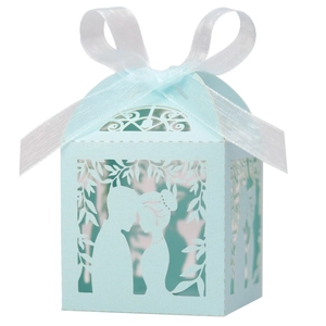 Detailed laser-cut light blue wedding favors box featuring a romantic couple silhouette