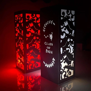 Close-up of Class of 2024 paper lantern with intricate laser-cut hollow patterns