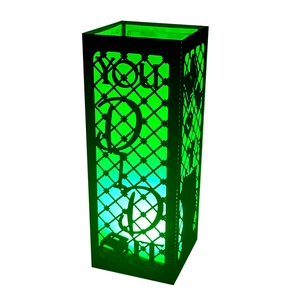Detail view of black hollowed paper lantern with green light and You Did It lettering