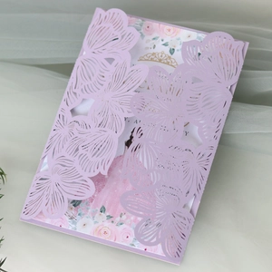 Detailed laser-cut lavender invitation featuring floral inner card and pink dress illustration