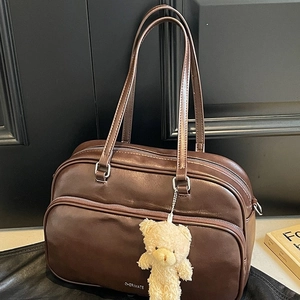 Retro deep brown large capacity pillow bag with a plush bear charm for daily commute
