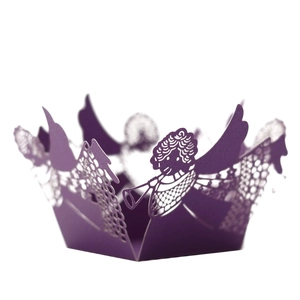 Macro detail of laser-cut dark purple cupcake wrappers with angel hollow pattern