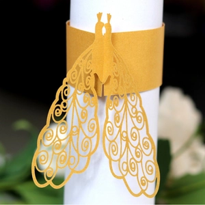Laser-cut gold paper napkin ring with peacock hollow design for wedding table decor
